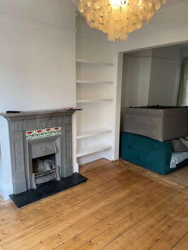 Victorian fireplace and shelving