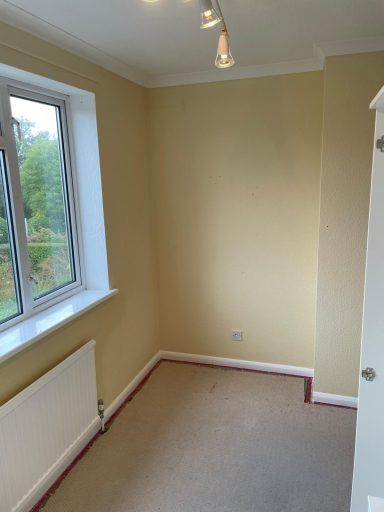 Bedroom decorated in Sand colour